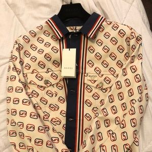 Brand new authentic Gucci Jacket with tags  Gucci Hanger Saks Bag never worn